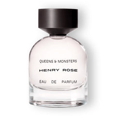 Henry Rose Queens Monsters bottle front with amber glow for daily unisex wear.