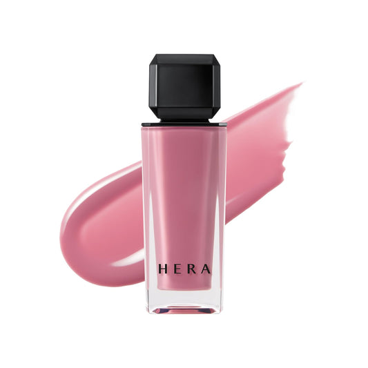 HERA Sensual Nude Gloss Flirty swatch shows sheer color with a glossy finish.