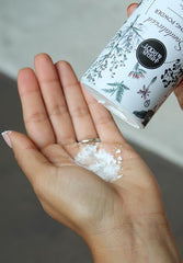 Herb and Root sandalwood powder texture close-up for gentle application.