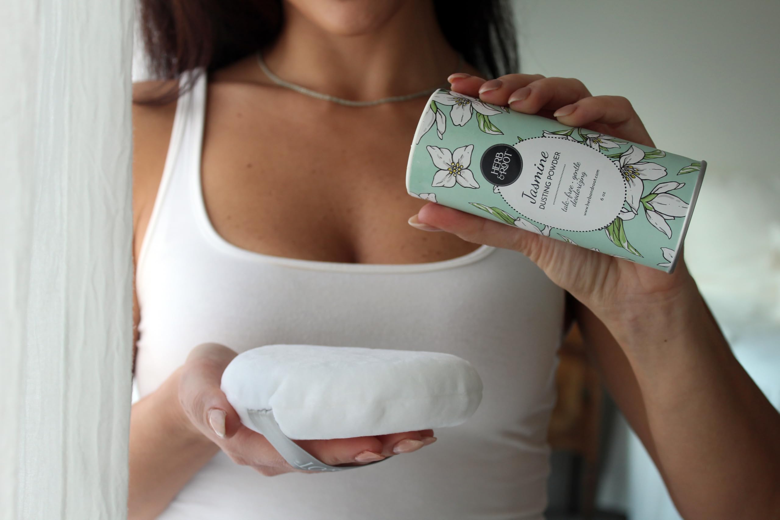 Herb & Root Sandalwood talc-free body powder bottle for breathable skin and subtle scent.