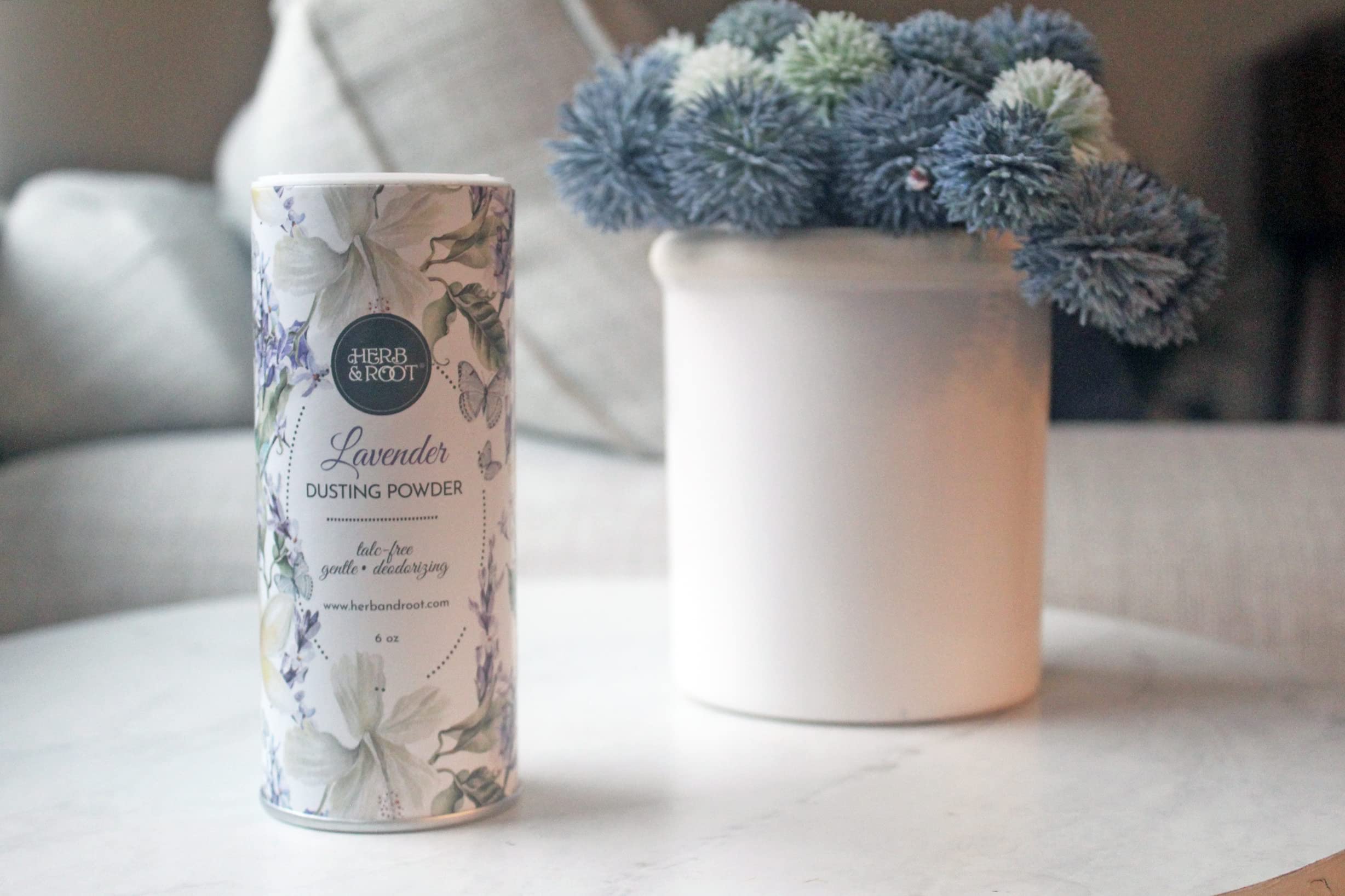 Herb & Root Lavender talc-free body powder jar; relaxing scent and lasting freshness.