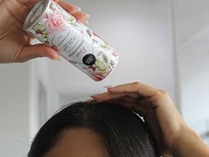Herb & Root Sandalwood talc-free powder jar shows smooth texture.