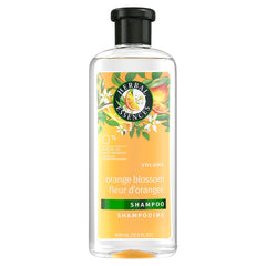 Herbal Essences Orange Citrus Volume Shampoo bottle promotes lift for fine hair.