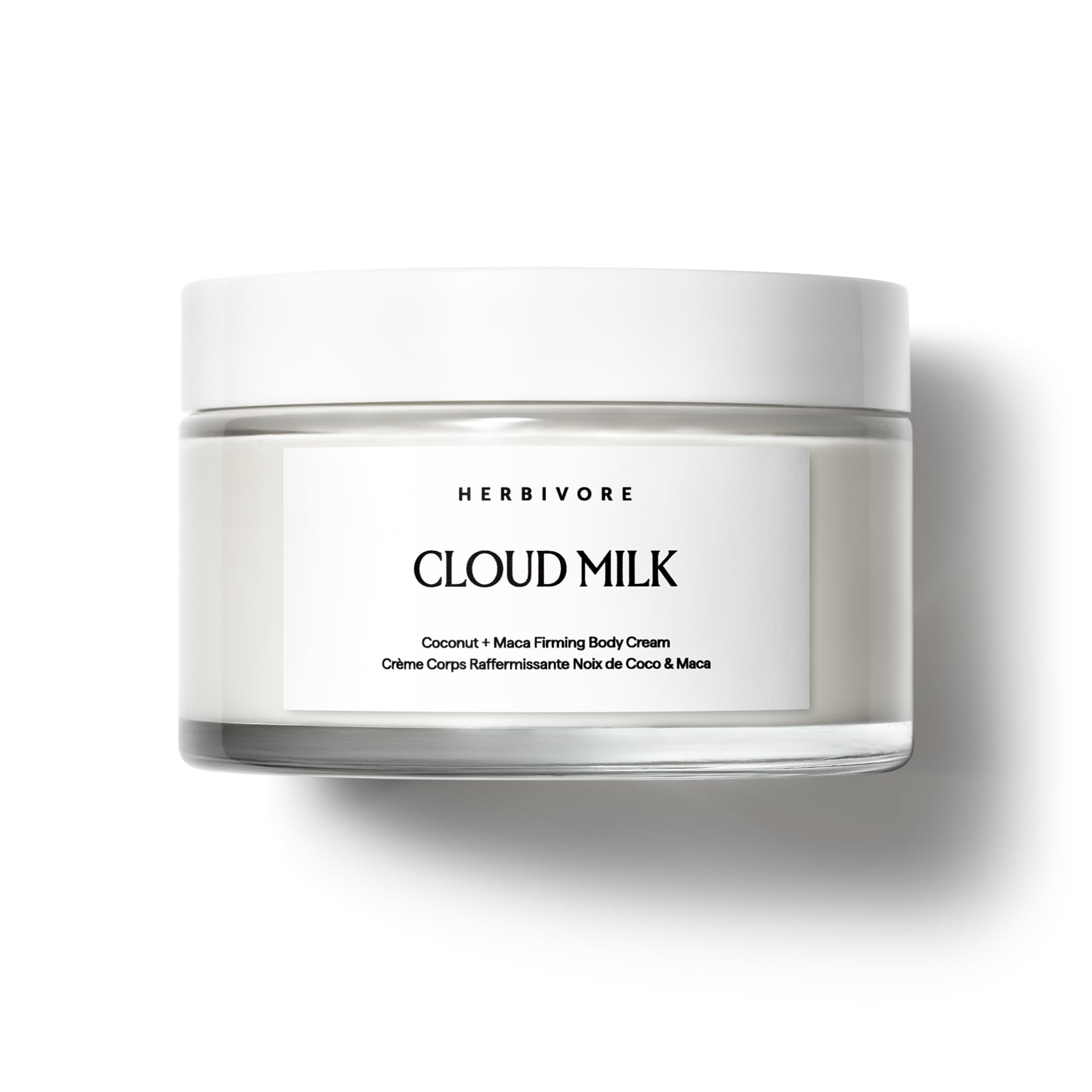 HERBIVORE Cloud Milk Body Cream jar demonstrates hydrating, non-greasy hydration.