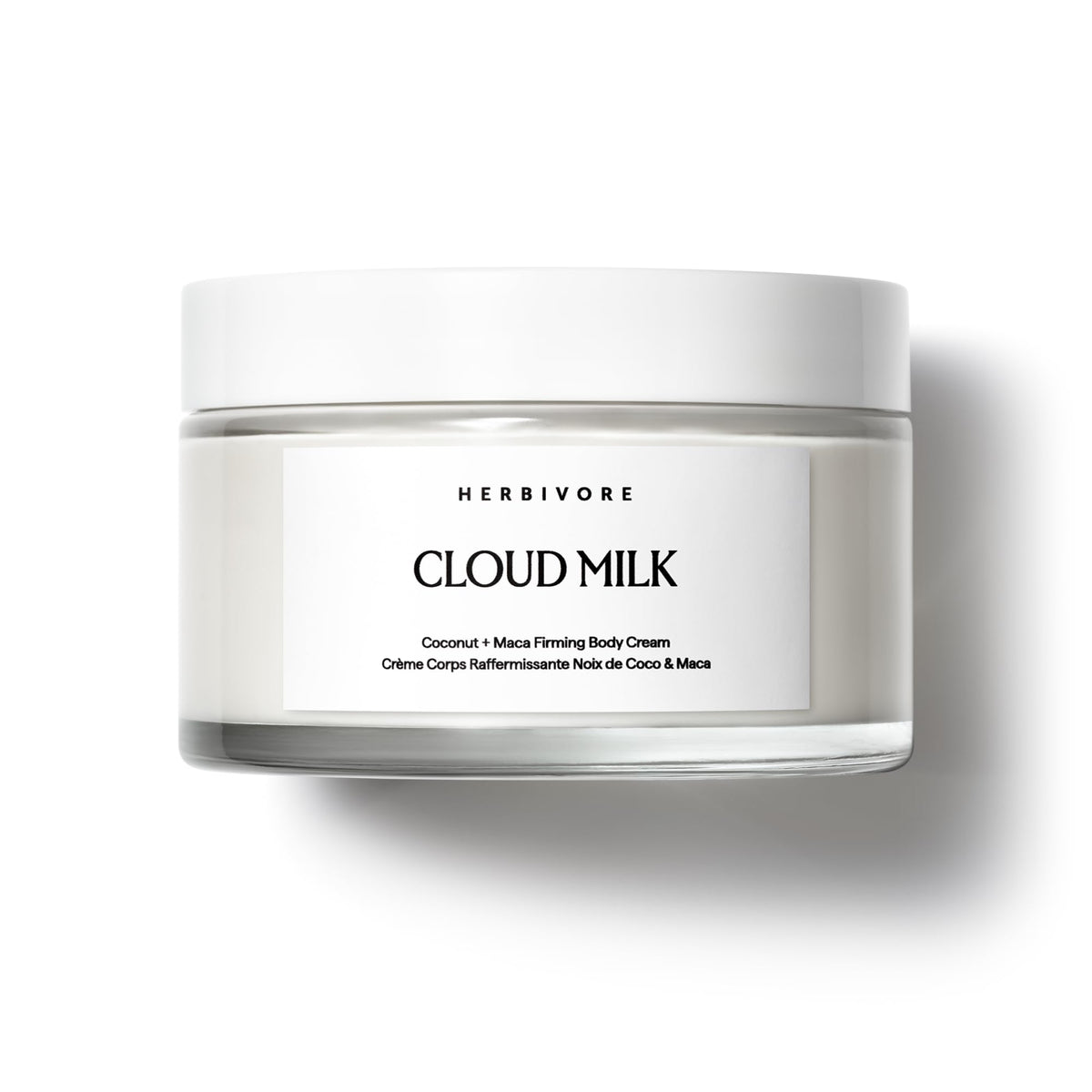 HERBIVORE Cloud Milk Body Cream jar demonstrates hydrating, non-greasy hydration.
