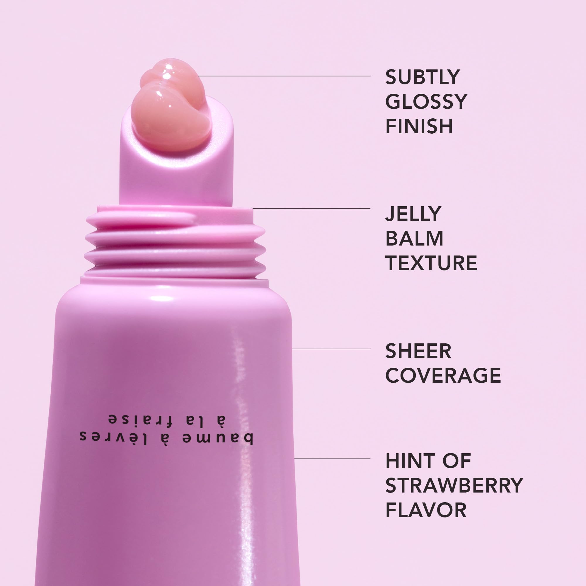 HERBIVORE Dream Jelly lip balm application on lips provides a plump-looking sheen.
