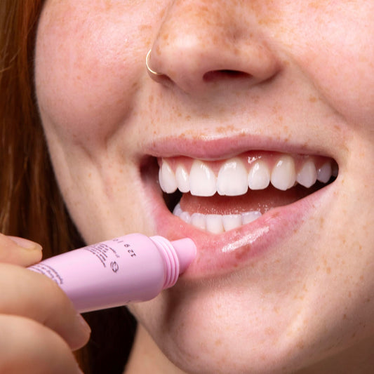 HERBIVORE Dream Jelly lip balm texture glides smoothly for instant comfort.