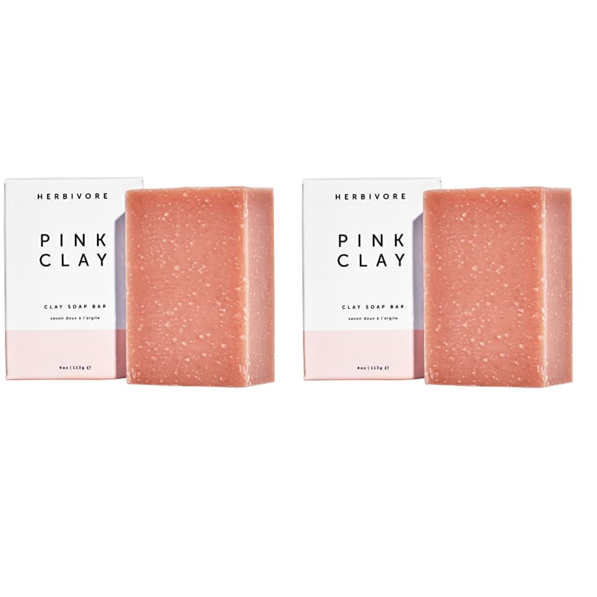 HERBIVORE Pink Clay Soap bar close-up for gentle cleansing on face and body.