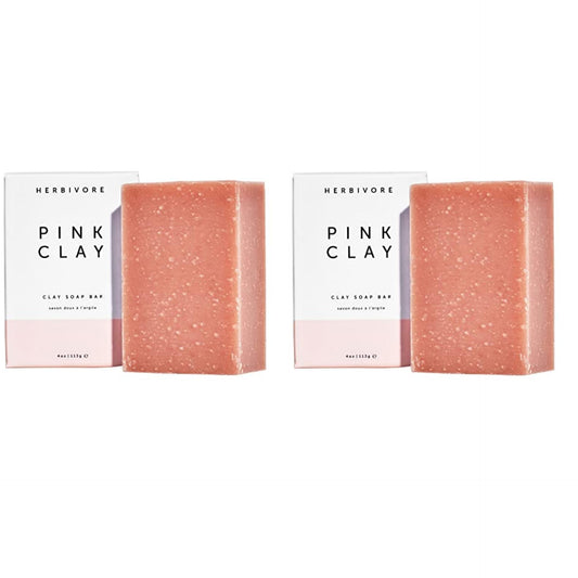 HERBIVORE Pink Clay Soap bar close-up for gentle cleansing on face and body.