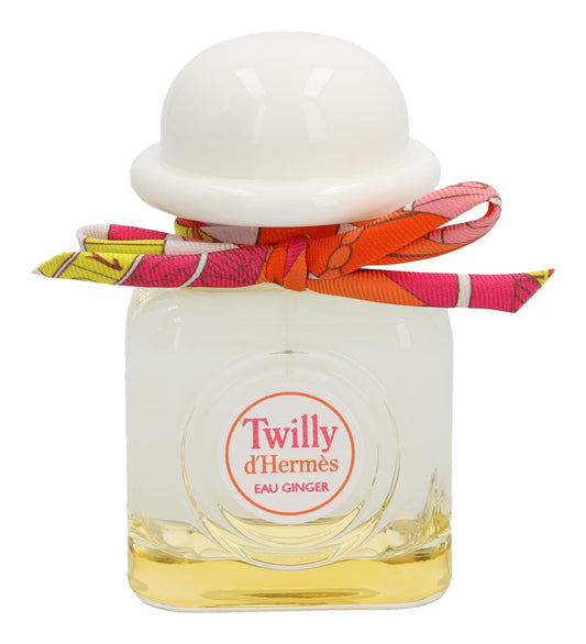 Hermès Twilly Eau Ginger cap detail highlighting elegant branding and premium packaging.