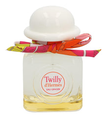 Hermès Twilly Eau Ginger cap detail highlighting elegant branding and premium packaging.