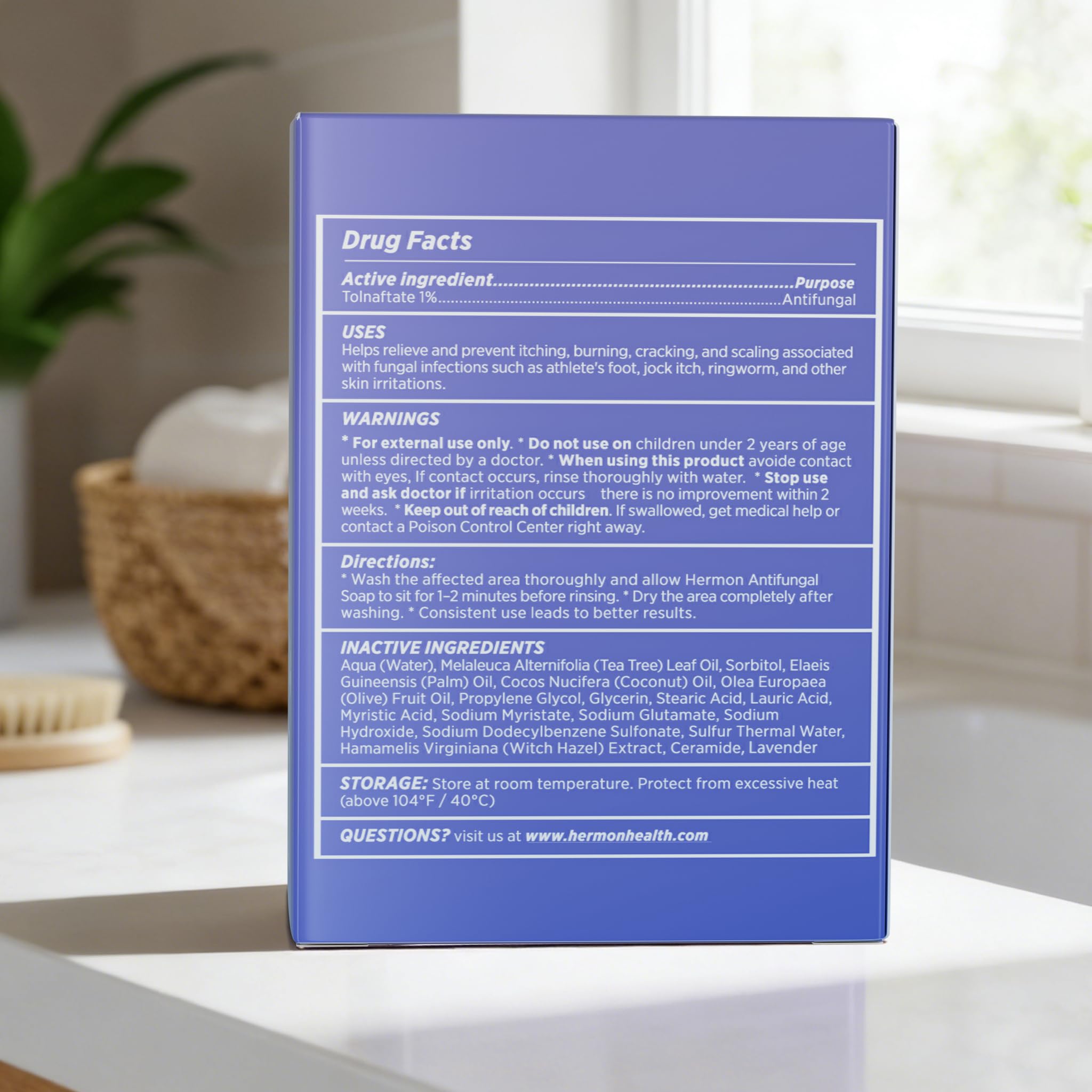 Hermon natural ingredients label highlights tea tree and lavender for clean skin.