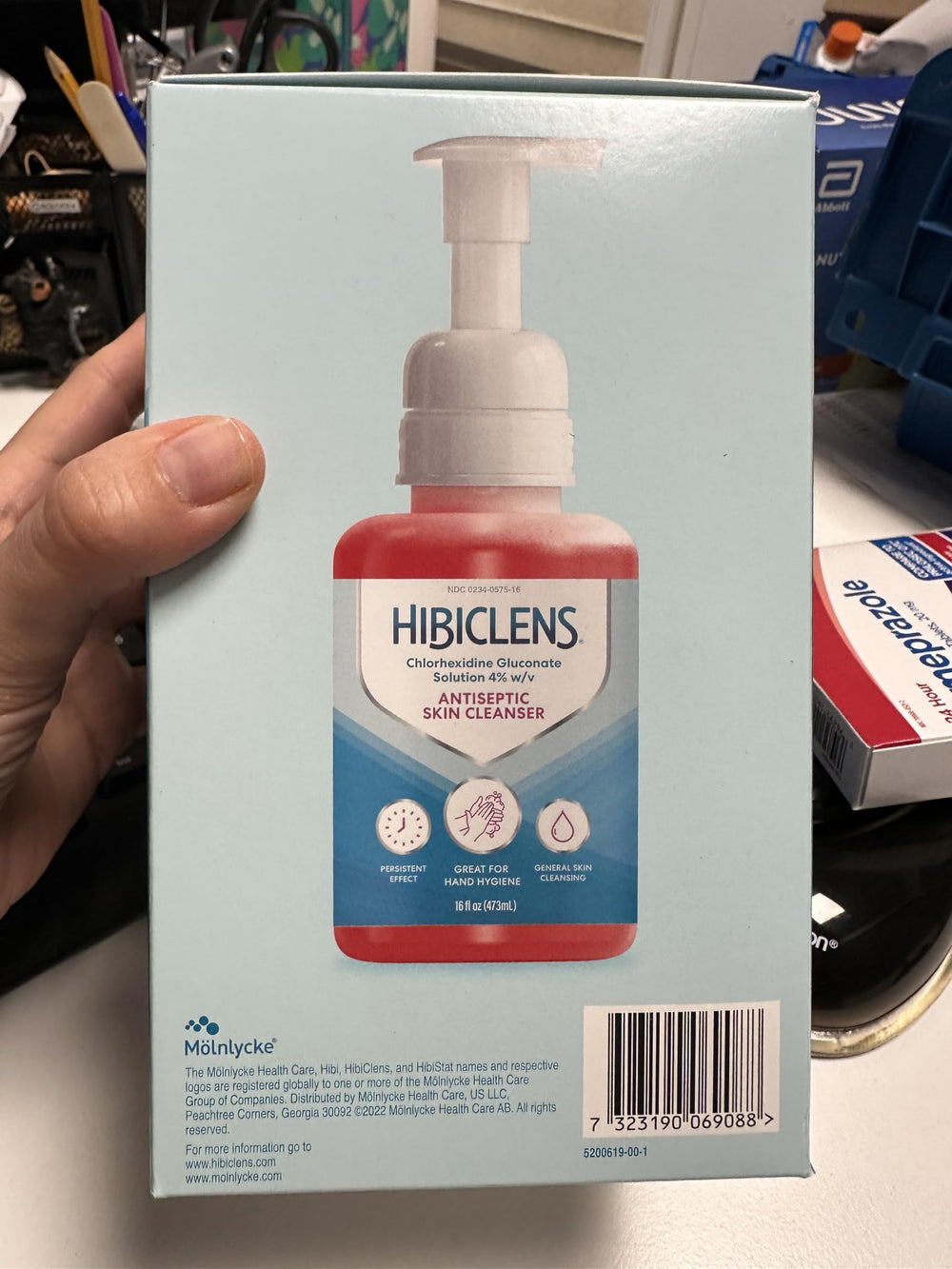 Hibiclens handwash foaming lather on hands for routine hygiene.