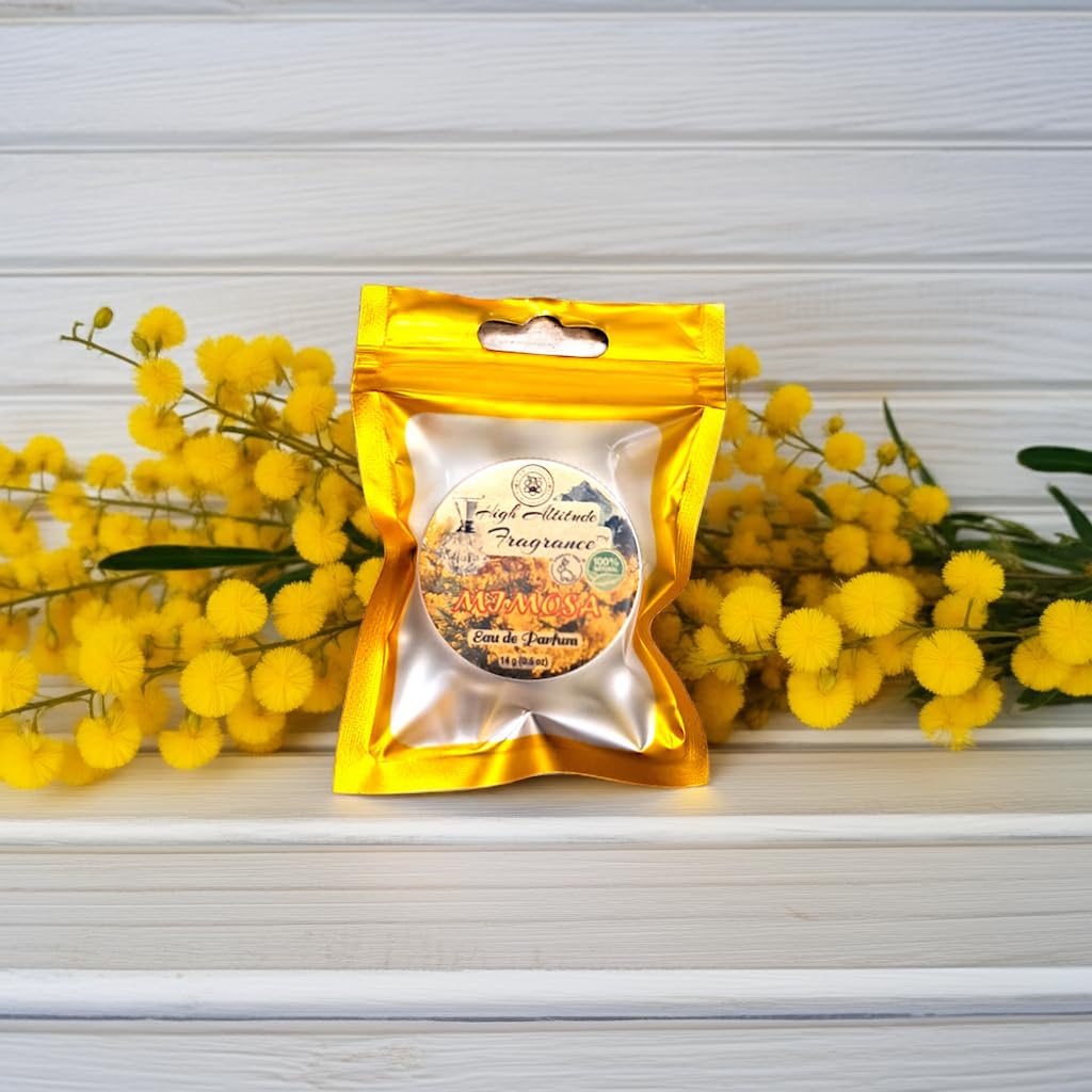 HIGH ALTITUDE ORGANICS Mimosa solid perfume application on skin demonstrates easy wear