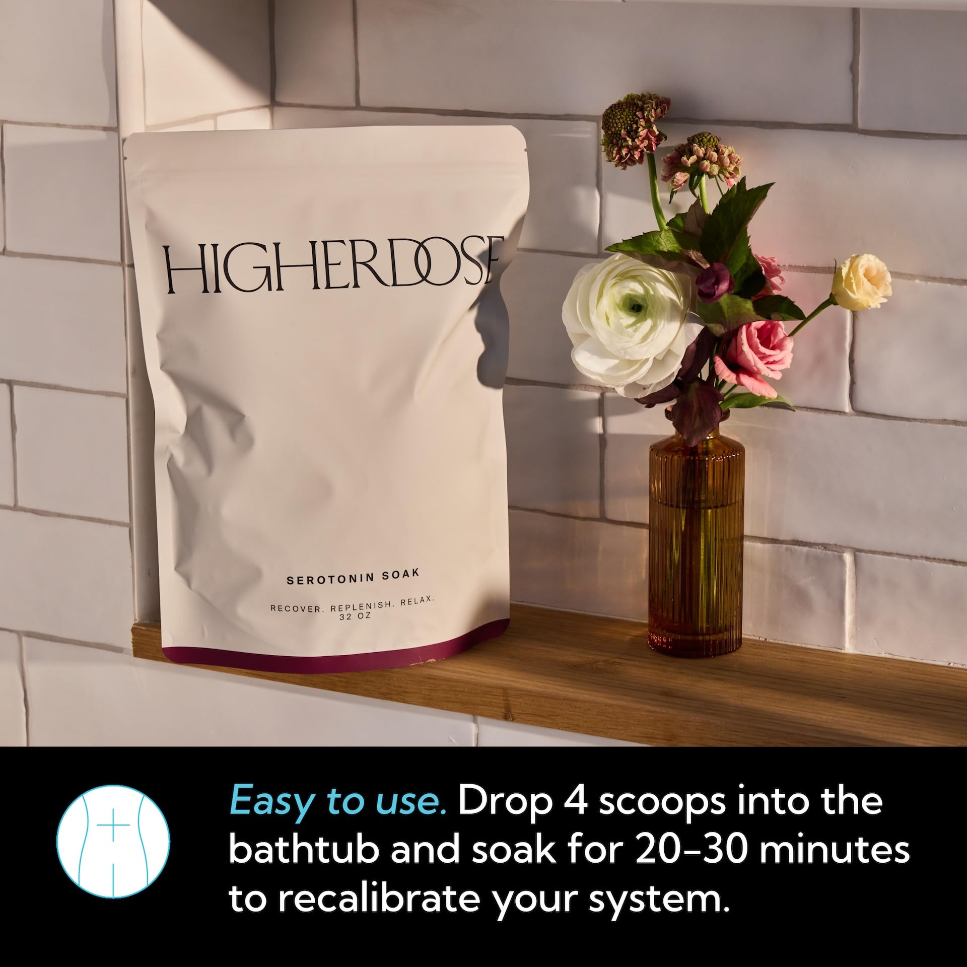 HigherDOSE relaxing essential oils bottle releasing calming aroma in a spa setting.