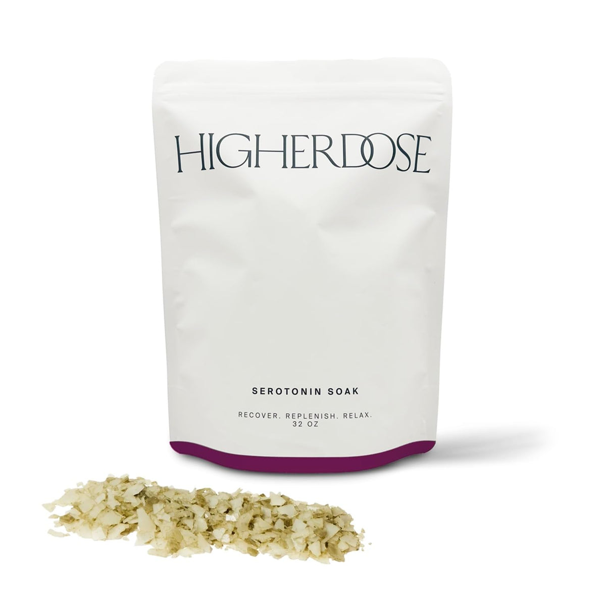 HigherDOSE Serotonin Soak bath salts pouring into a warm tub for relaxation.