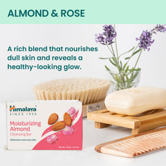 Himalaya almond cleansing bar hand application for smooth skin feel.