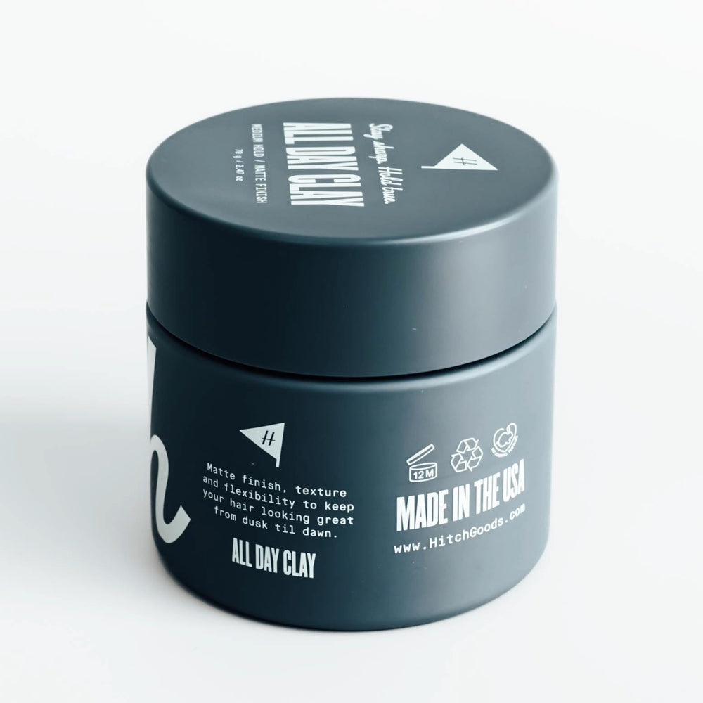 Hitch All Day Clay application on hair demonstrates easy emulsifying motion.