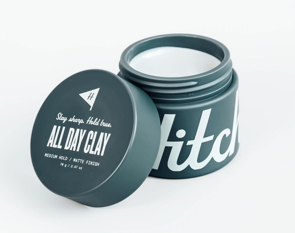 Hitch All Day Clay hands melting formula ready to style with ease.