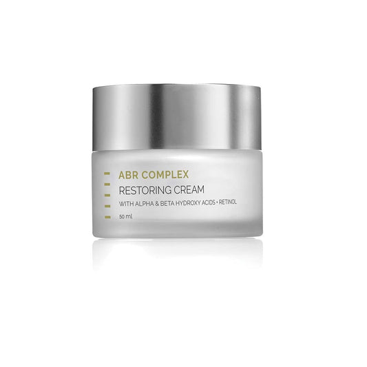 HL ABR Complex Restoring Night Cream application close-up, silky texture for evening use.