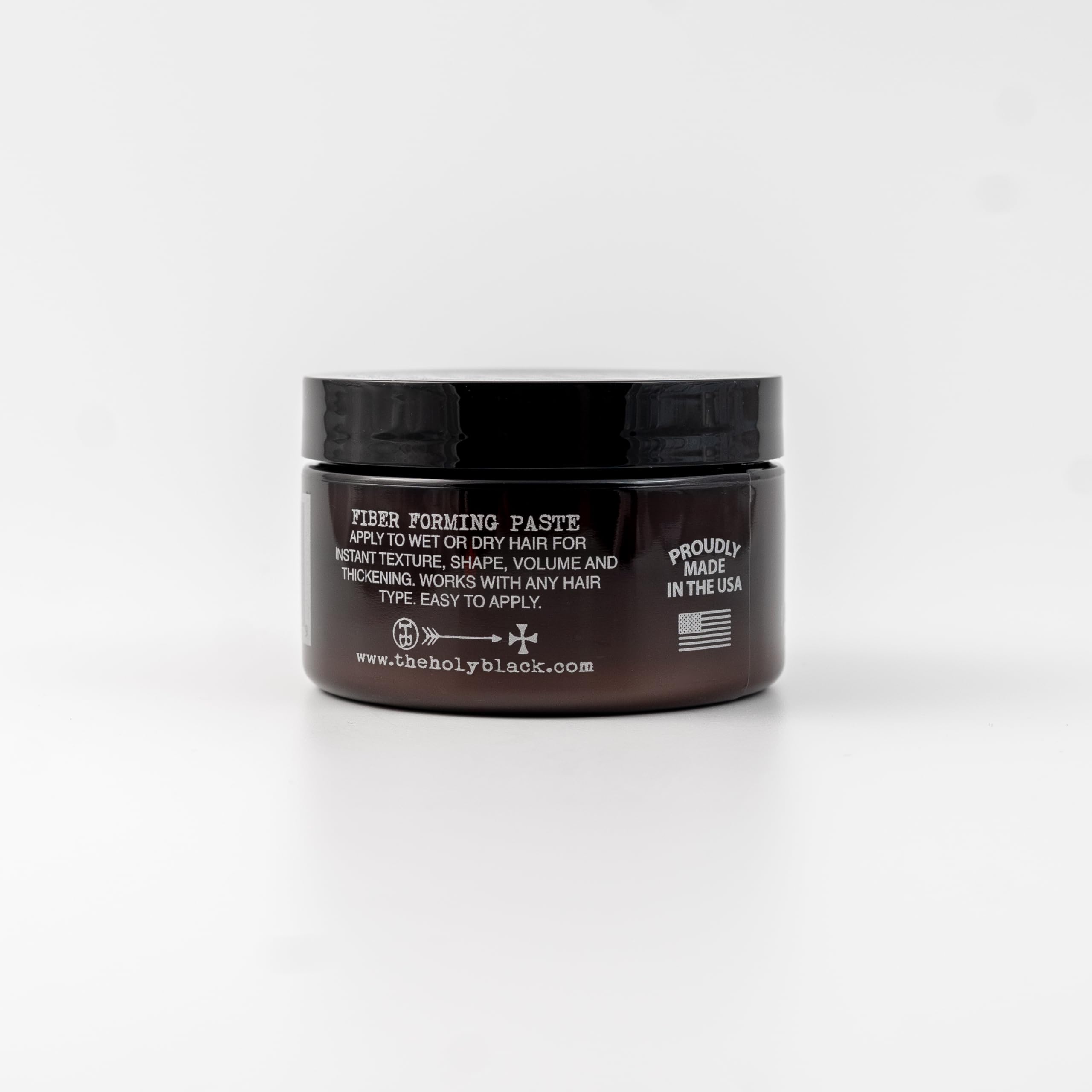 HOLY BLACK Fiber Forming Paste adds volume and thickness for fuller hair.