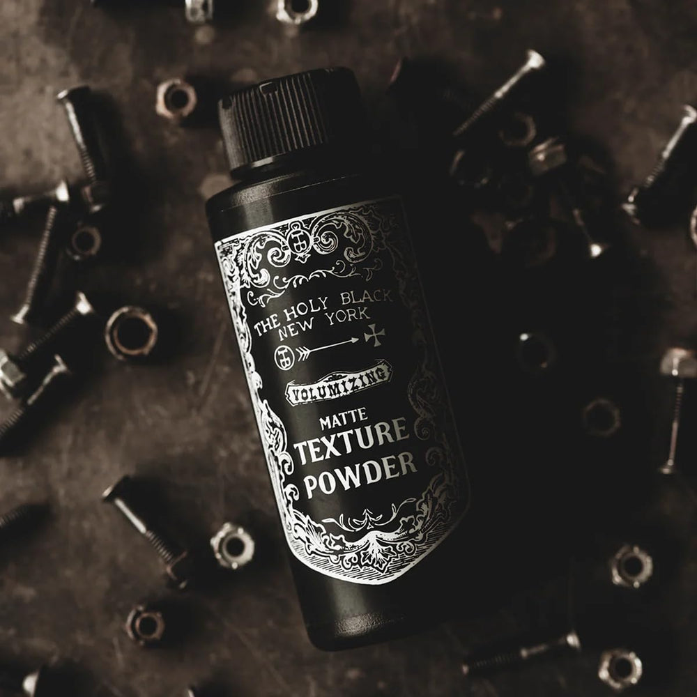 Velvety matte finish on hair or skin with Holy Black powder close-up