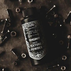 Velvety matte finish on hair or skin with Holy Black powder close-up