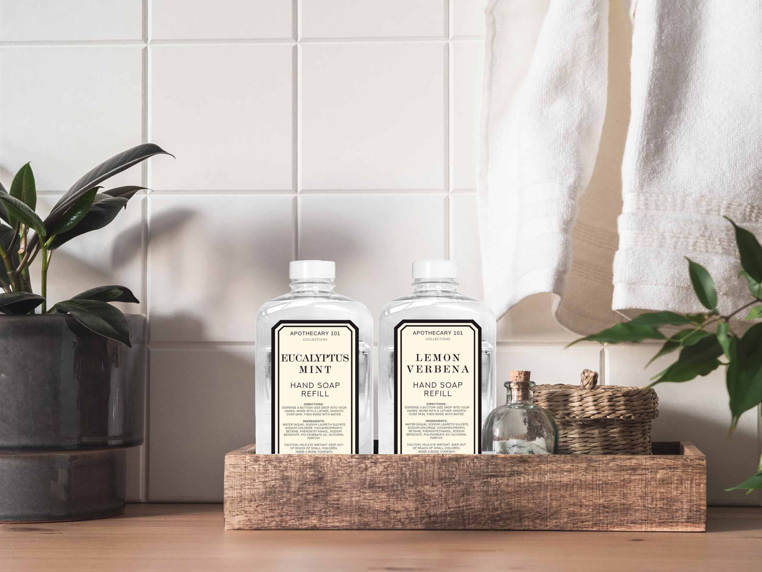 Home and Body Company Apothecary 101 Eucalyptus Mint refill bottle pouring for invigorating hands.