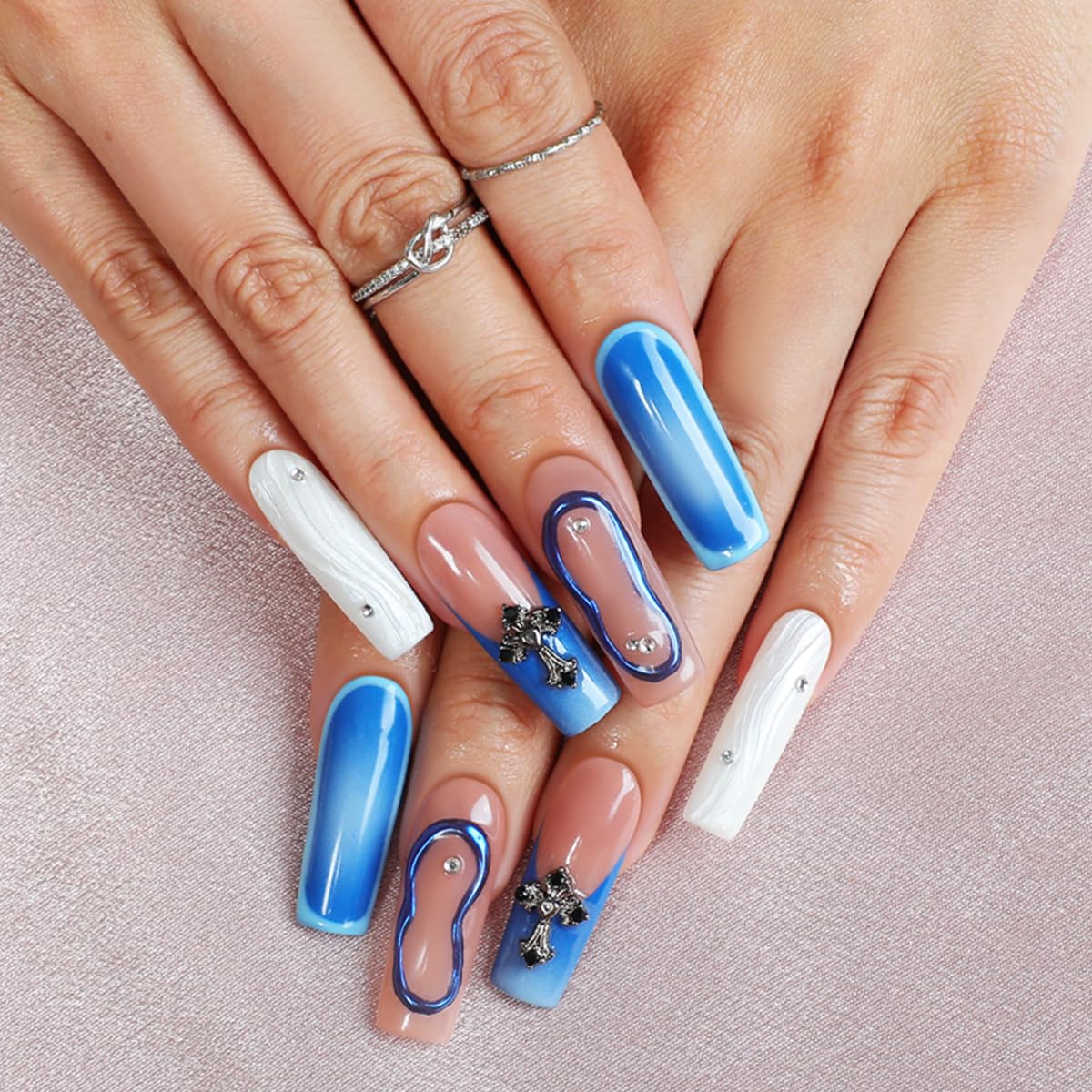 Homsera blue nails featuring 3D cross decor for a standout home manicure.
