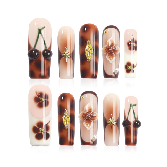 Homsera cherry-embossed press-on nails in long coffin shape for a chic, salon-like manicure.