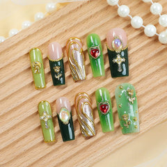 Homsera XL French tip in green and gold glitter for chic, dramatic nail style.