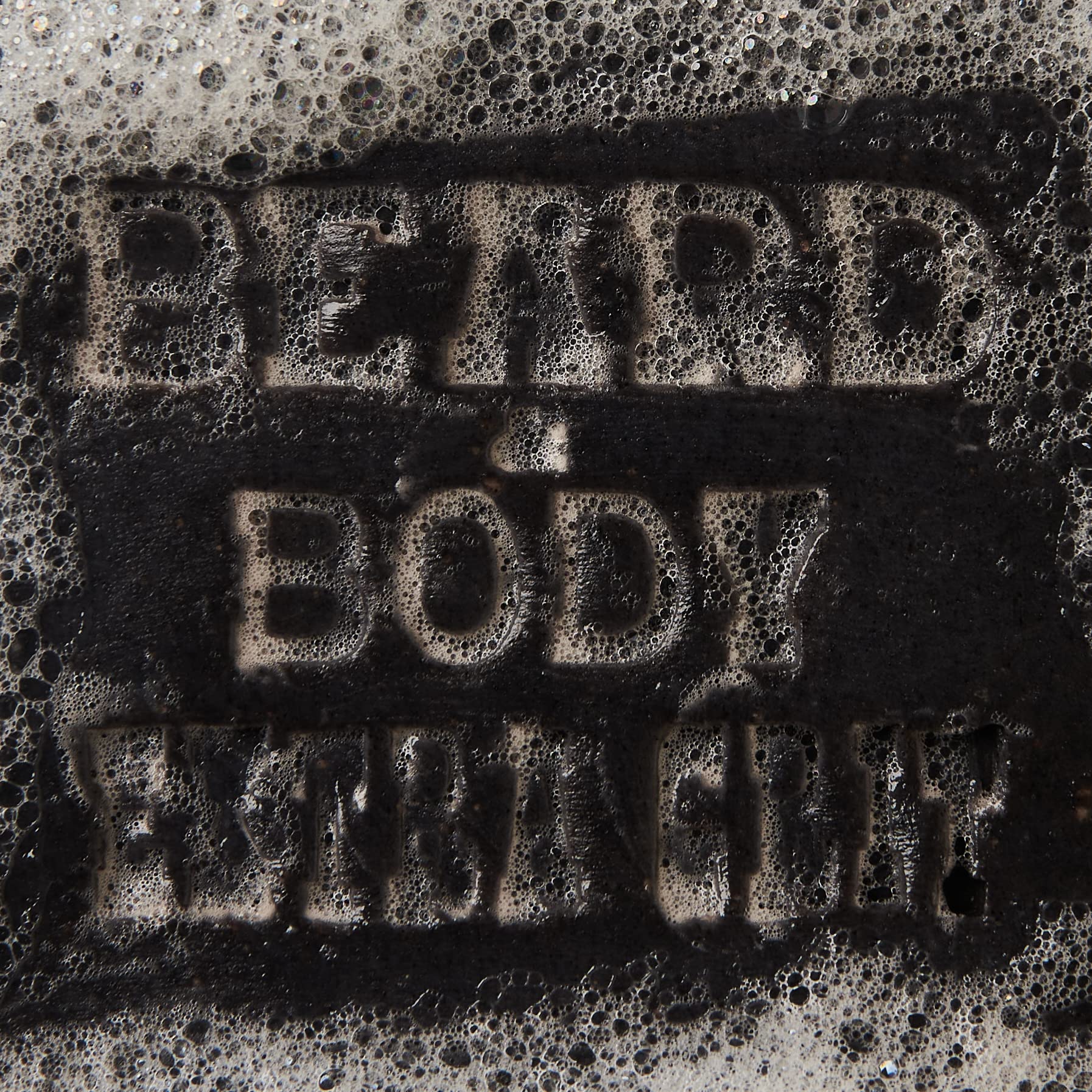Hands lathering with Honest Amish soap to refresh beard and skin