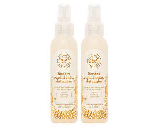 The Honest Conditioning Detangler bottle with Sweet Orange Vanilla for smooth, tangle-free hair.