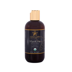 Honey Girl Organics ManKine bottle on shelf highlighting hydrating formula.