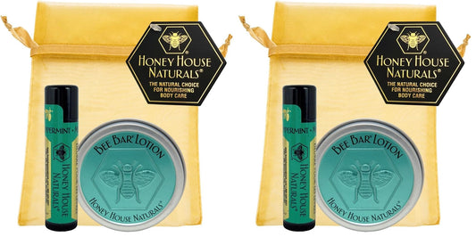 Honey House Naturals Bee Bar is applied to hands for lasting moisture.