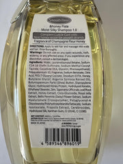 Visual of golden silk elements in Honey Pixie Moist Silky Shampoo for shine