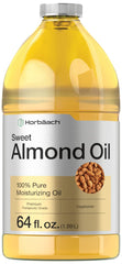 Horbaach Sweet Almond Oil bottle pouring for hair and skin hydration.