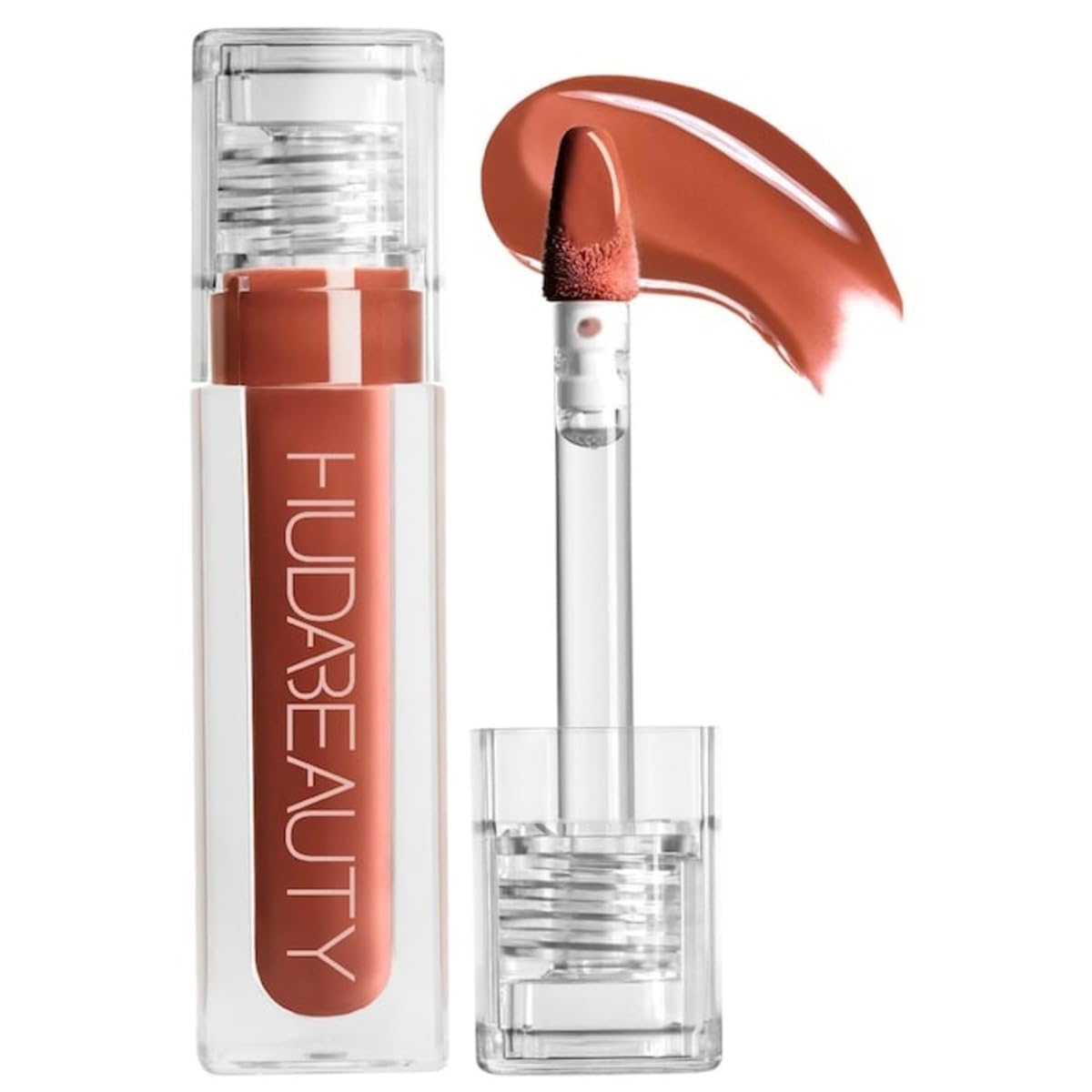 Huda Faux Filler Extra Shine Foxy application close-up for smooth, hydrated lips.