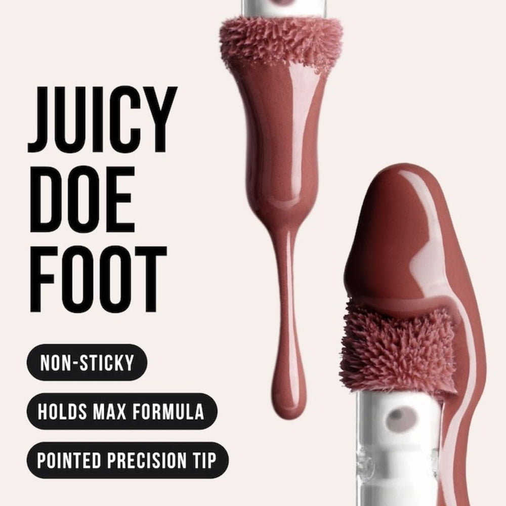 Huda Faux Filler Extra Shine Foxy bottle packaging with premium branding.