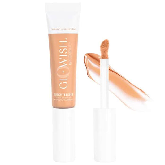 Huda GloWish Bright Light concealer bottle close-up, highlighting hydrating, sheer coverage.