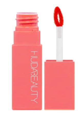 Huda Lip Blush Coral Kiss application glide for smooth color