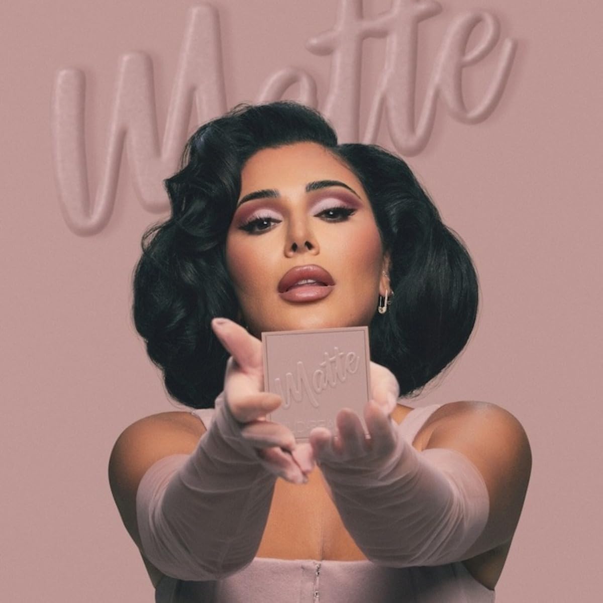 Huda Matte Obsessions packaging front emphasizes clean, natural ingredients for mindful application.