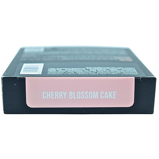 Huda pressed brightening powder with sponge applicator delivers natural finish and extended wear.