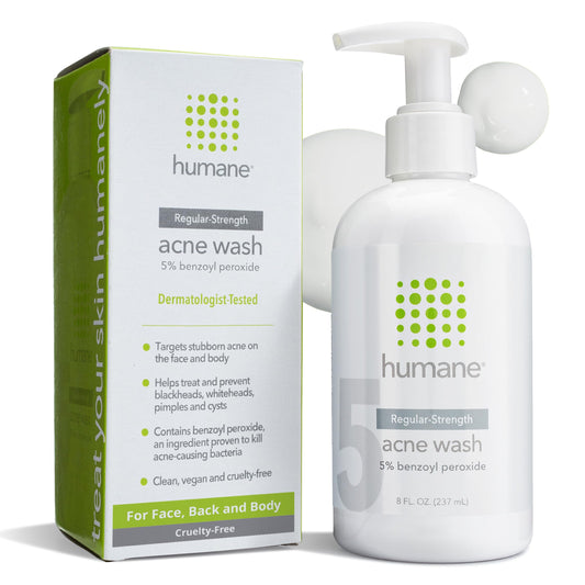 Humane 5% benzoyl peroxide face wash bottle highlights acne-prone skin benefits.