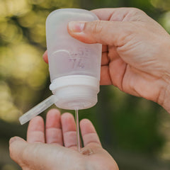 TSA-approved travel bottles fit carry-on limits.