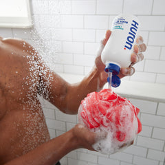 Coconut oil and vitamin E imagery highlighting nourishing formula in Huron wash