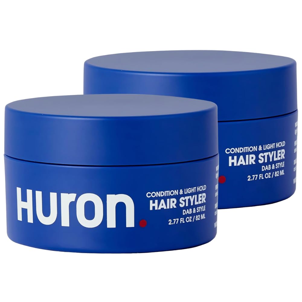 Huron Clean Citrus Woods bottle pour demonstrates easy daily styling and smooth application.