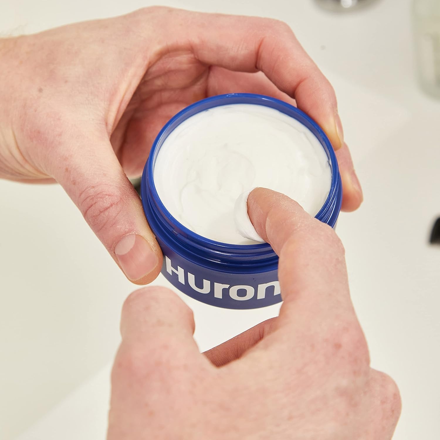Huron Clean Citrus Woods packaging recycled underscores eco-friendly grooming choice.
