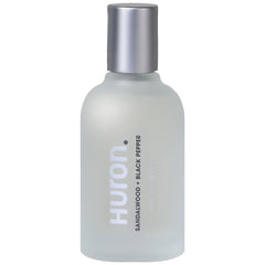 Huron Men's Cologne bottle on dresser adds subtle refinement to daily routines