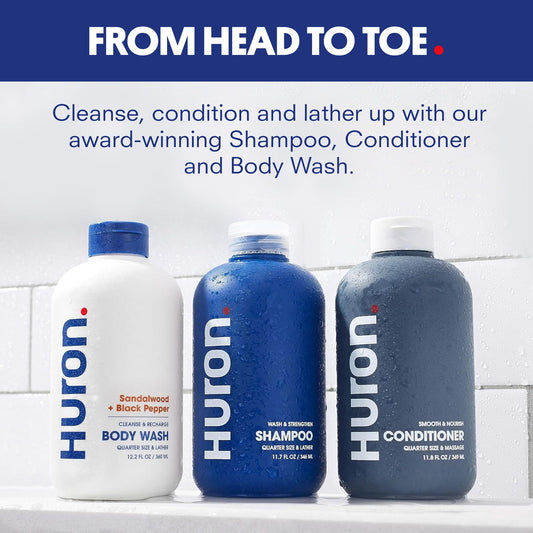 Huron Shower Kit conditioner bottle closeup for nourished hair